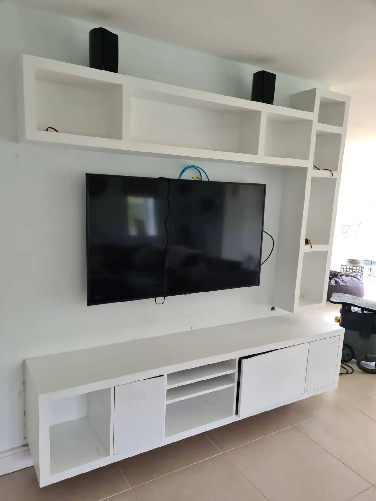 Built-in media wall in a Gloucestershire living room